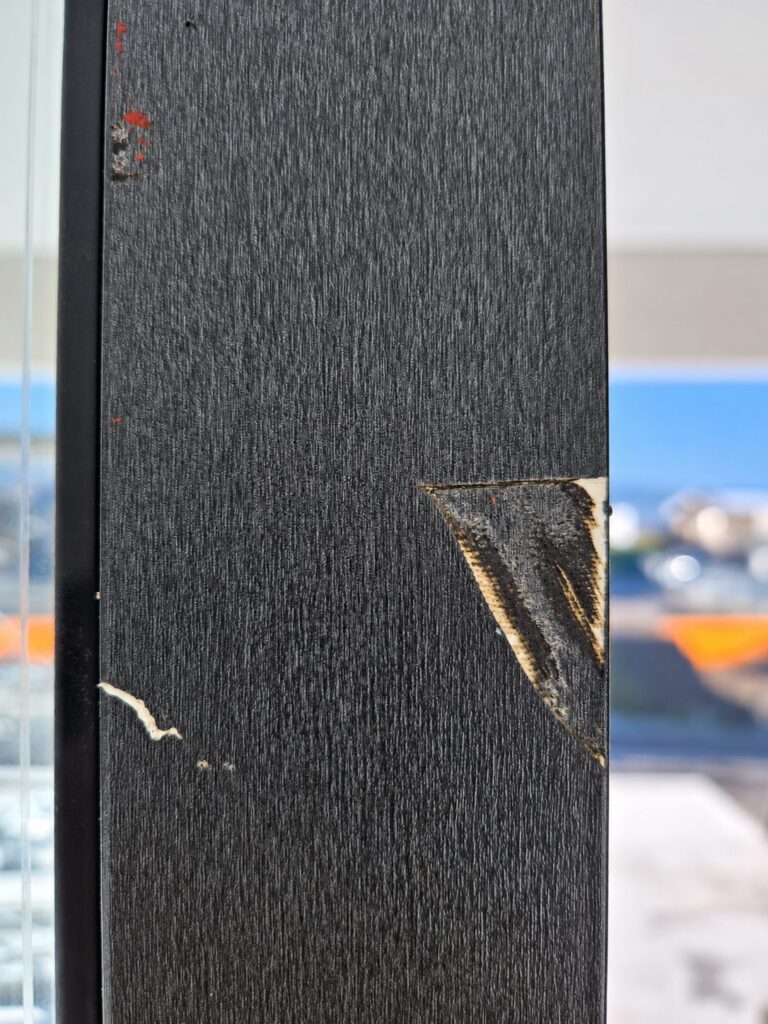 Scratched HST sliding sash before repair
