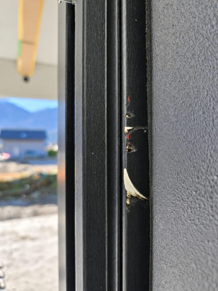 HST sliding door frame dented before repair
